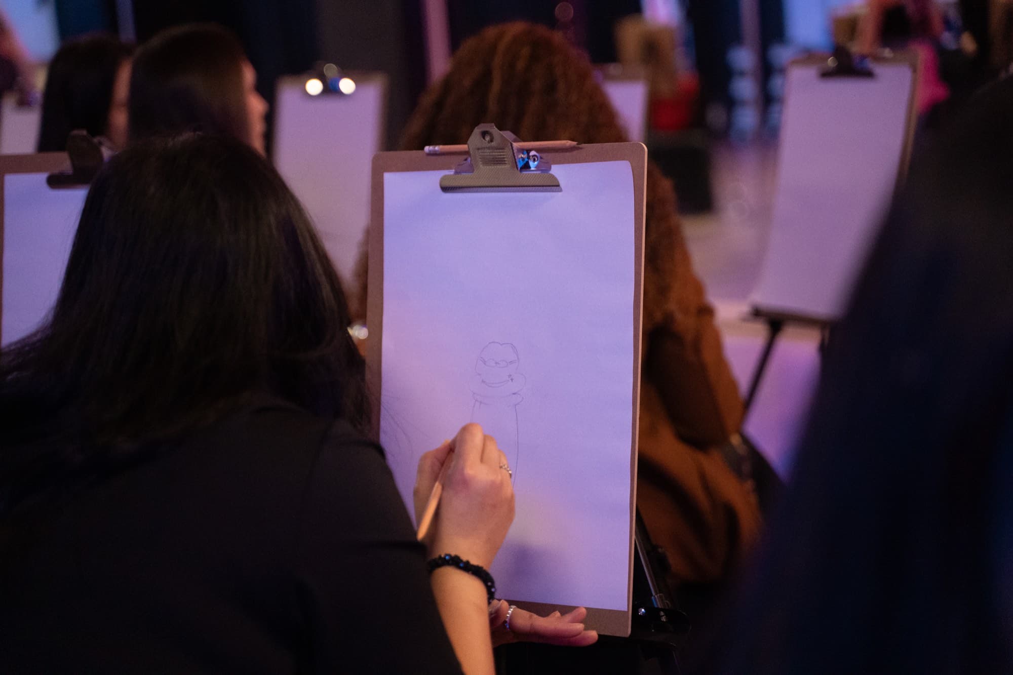 A life drawing session underway at a hens party.